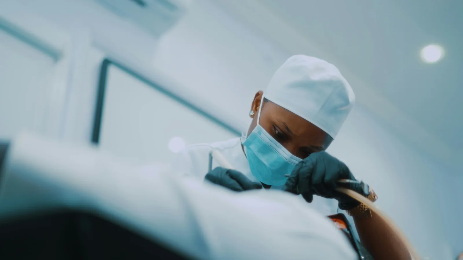 Specialist performing a detailed pelvic ultrasound to assess the uterine wall