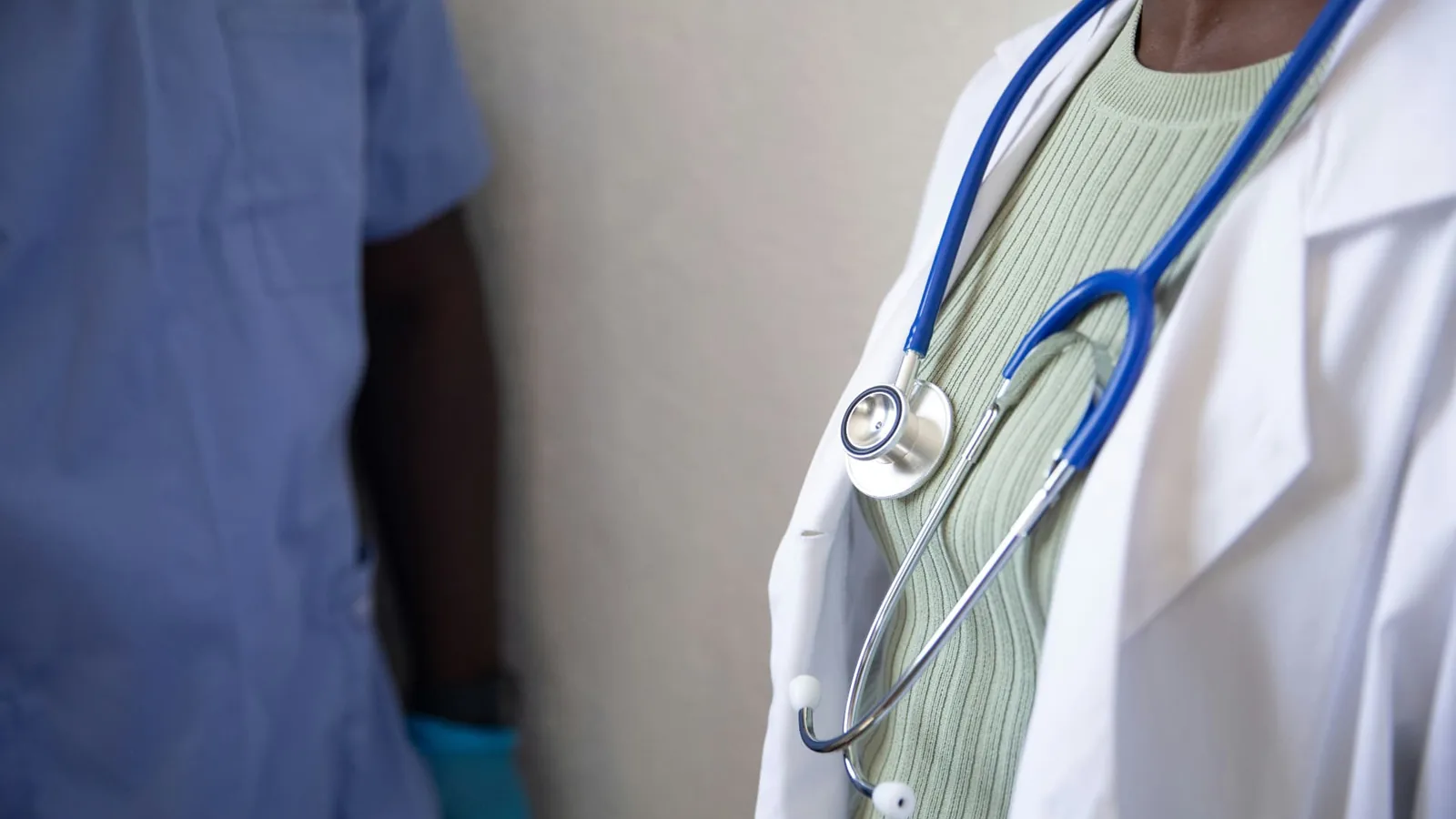 Woman attending a secure video consultation with her gynecologist from home