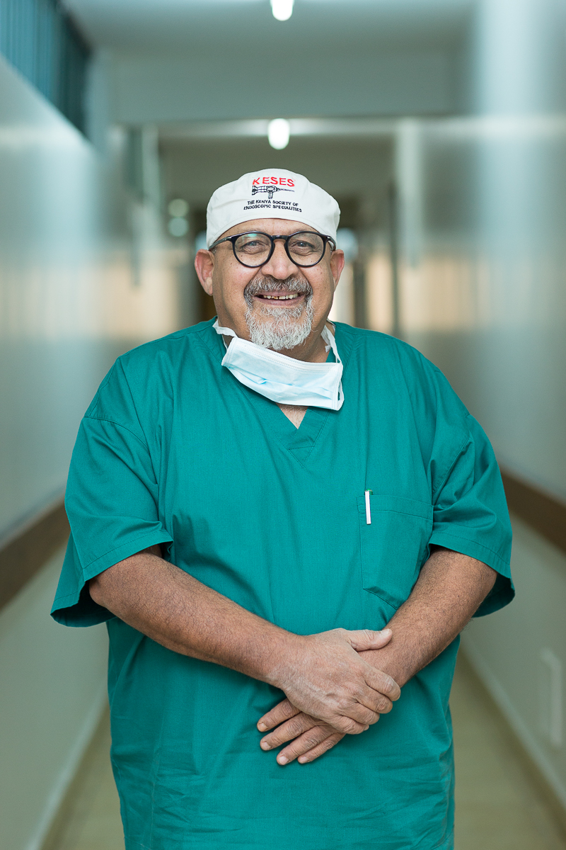 Prof. Parkar in surgical scrubs at KLASS Nairobi